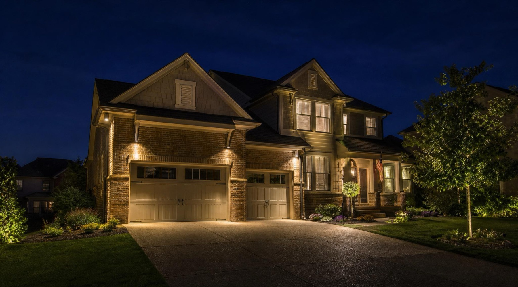 Concept: suburban home exterior lighting at night